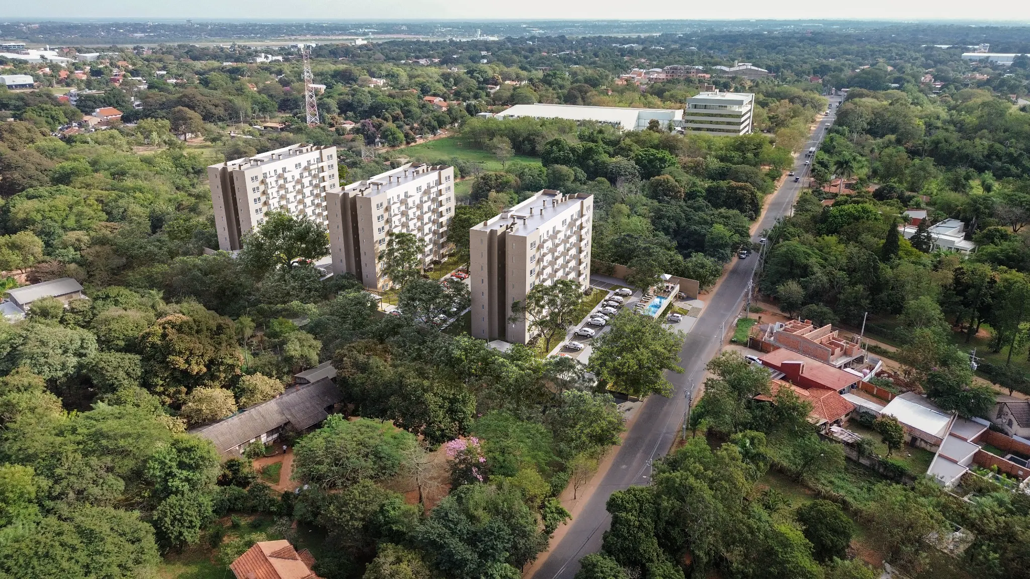 Vista aérea del Complejo República mostrando tres torres residenciales en Luque